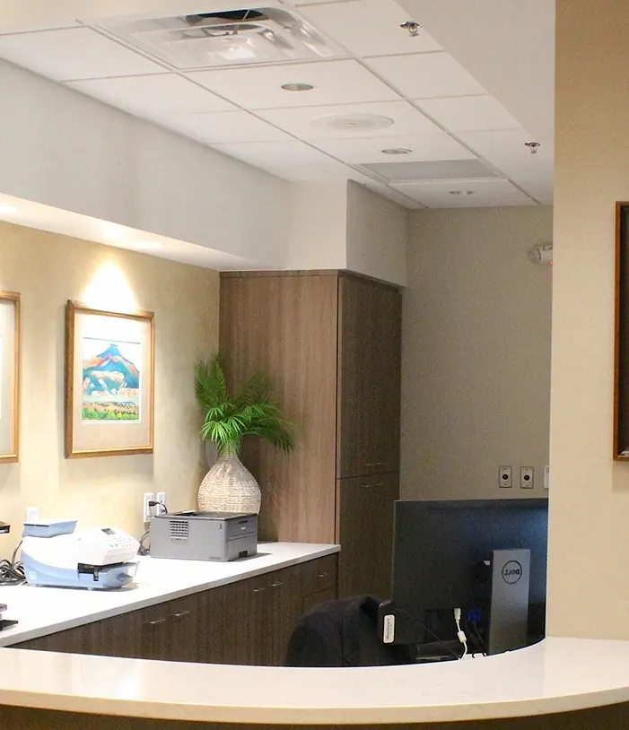 The front desk and the corridor to the treatment rooms.